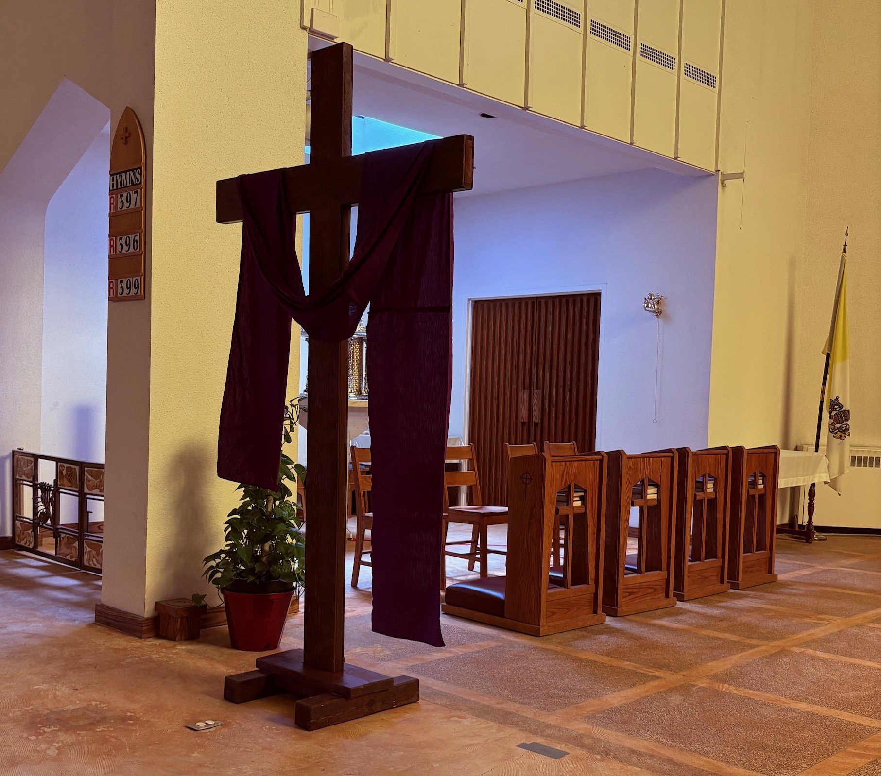 Cross On Altar Near Tabernacle