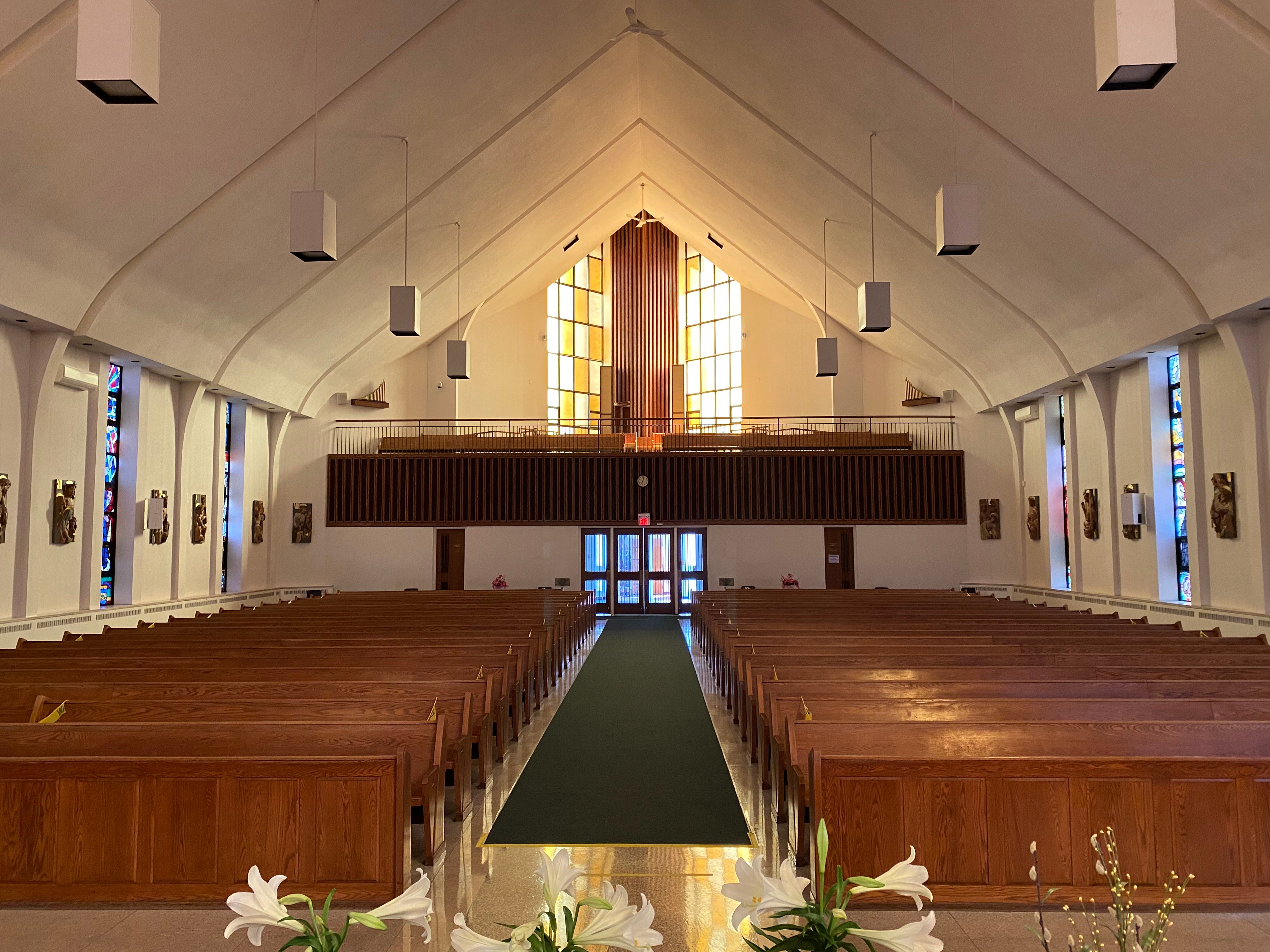 Church interior view from the altar facing pews